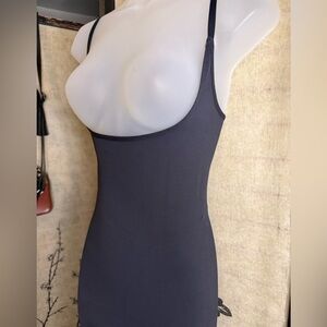 Black Spaghetti Shapewear Skims holds mid section, enhances butt and breast.